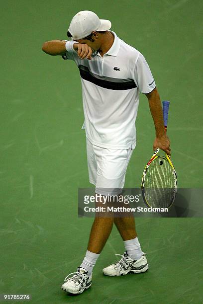 Richard Gasquet of France walks back to the baseline between points against David Ferrer of Spain during day two of the 2009 Shanghai ATP Masters...
