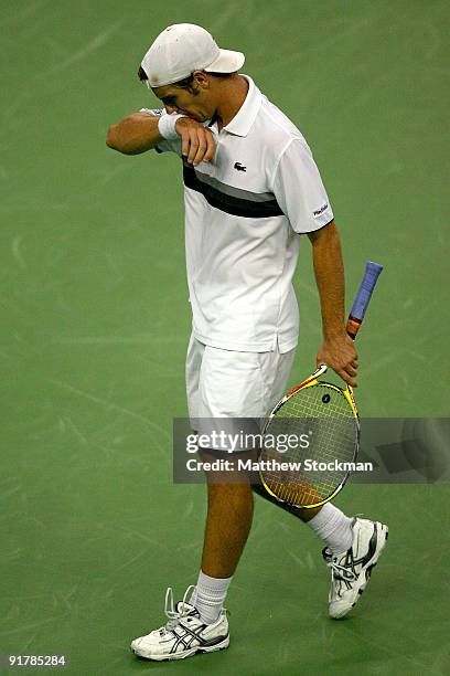 Richard Gasquet of France walks back to the baseline between points against David Ferrer of Spain during day two of the 2009 Shanghai ATP Masters...