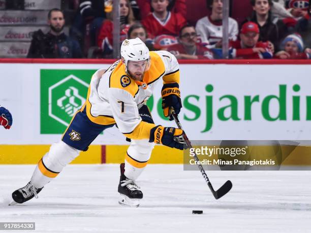 Yannick Weber of the Nashville Predators skates the puck against the Montreal Canadiens during the NHL game at the Bell Centre on February 10, 2018...