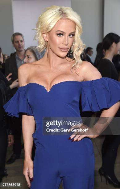 Gigi Gorgeous attends the Badgley Mischka fashion show during New York Fashion Week at Gallery I at Spring Studios on February 13, 2018 in New York...