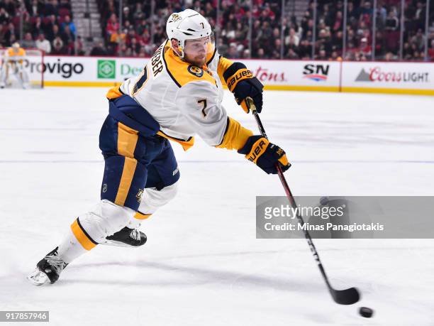 Yannick Weber of the Nashville Predators shoots the puck against the Montreal Canadiens during the NHL game at the Bell Centre on February 10, 2018...