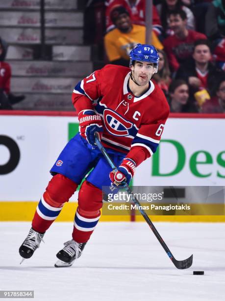 Max Pacioretty of the Montreal Canadiens skates the puck in overtime against the Nashville Predators during the NHL game at the Bell Centre on...