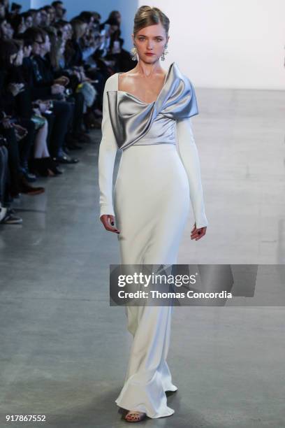 Vlada Roslyakova walks the runway wearing Badgley Mischka Fall 2018 at Gallery I at Spring Studios on February 13, 2018 in New York City.