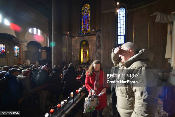 View of the crowd at the chapel with the statue of patron saint of love, St. Valentine, inside Whitefriar Church in Dublin. St. Valentine, the patron...