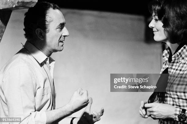 Italian film director Michelangelo Antonioni talks with English actress Vanessa Redgrave on the set of their film, 'Blow-Up,' London, England, 1965.