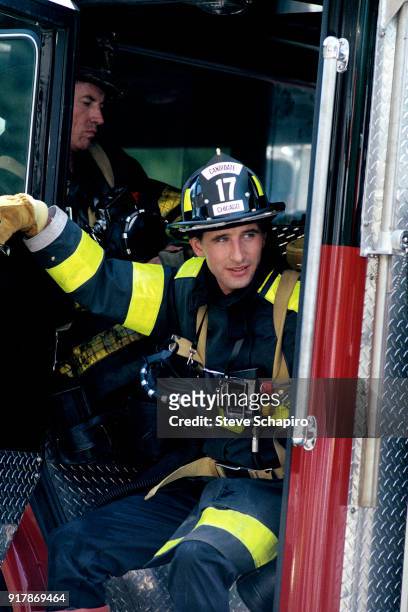 American actor William Baldwin on the set of the film 'Backdraft' , Los Angeles, California, 1990. Visible in the background is fellow actor Scott...