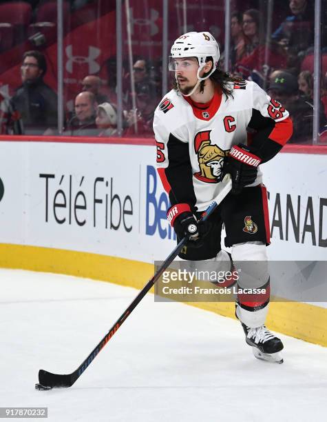Erik Karlsson of the Ottawa Senators skates with the puck against the Montreal Canadiens in the NHL game at the Bell Centre on February 4, 2018 in...