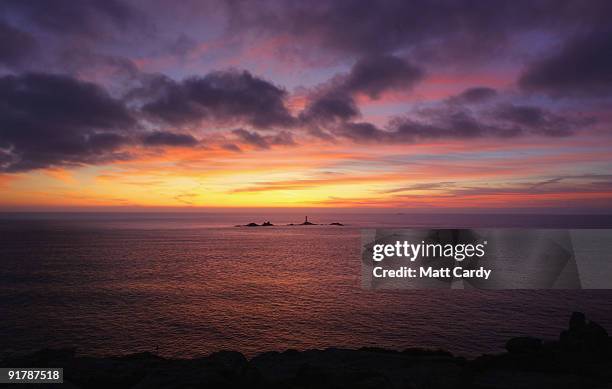 The sky over Lands End darkens after the sun has set October 10, 2009 in Cornwall, England. England, particularly in the south, is currently enjoying...