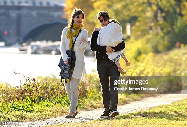 Katie Holmes, Suri Cruise and Tom Cruise visit Charles River Basin on October 10, 2009 in Cambridge, Massachusetts.