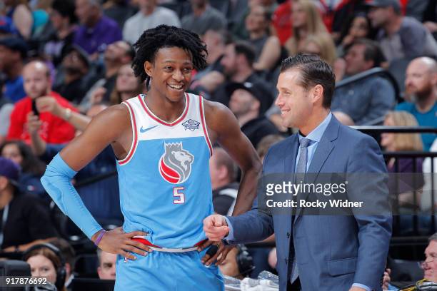 Head coach Dave Joerger of the Sacramento Kings talks with De'Aaron Fox during the game against the Chicago Bulls on February 5, 2018 at Golden 1...