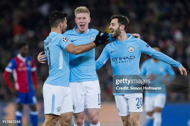 Sergio Aguero of Manchester City celebrates his team's third goal with team mates Kevin De Bruyne and Bernardo Silva during the UEFA Champions League...