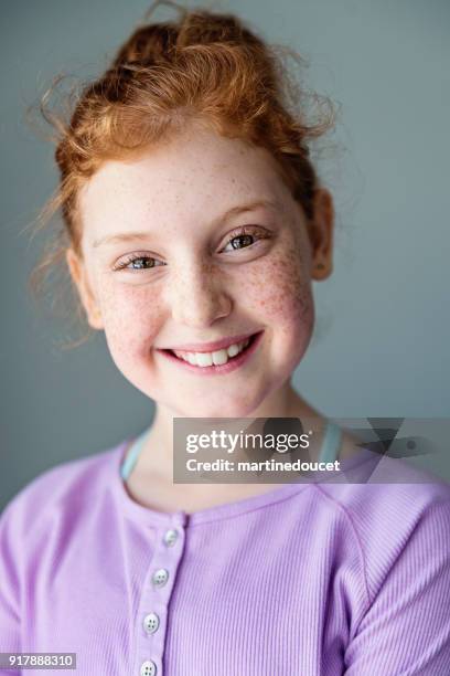 cute and expressive preteen girl with redhead portrait. - lightskinned stock pictures, royalty-free photos & images