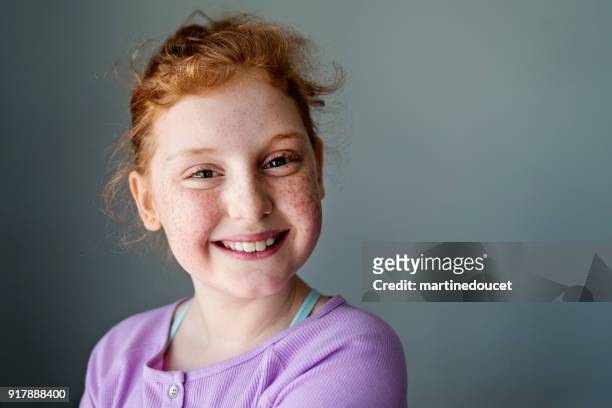 cute and expressive preteen girl with redhead portrait. - lightskinned stock pictures, royalty-free photos & images