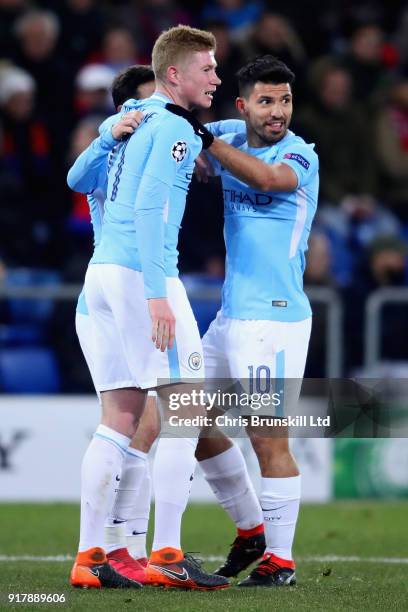 Sergio Aguero of Manchester City celebrates with teammate Kevin De Bruyne after scoring his teams third goal during the UEFA Champions League Round...