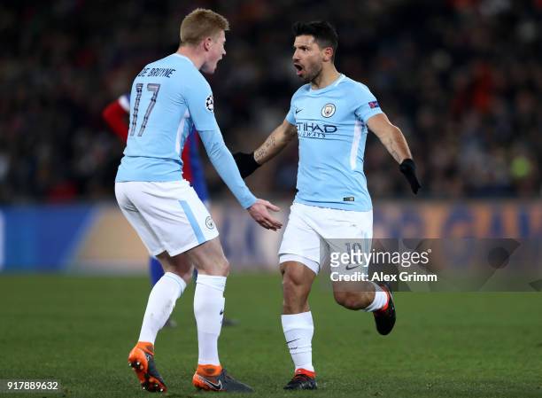 Sergio Aguero of Manchester City celebrates after scoring his sides third goal with Kevin De Bruyne of Manchester City during the UEFA Champions...