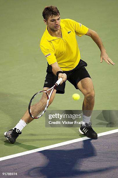 Stanistas Wawrinka of Switzerland returns a shot to Lukasz Kubot of Poland during day two of 2009 Shanghai ATP Masters 1000 at the Qi Zhong Tennis...