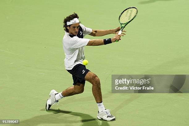Martin Vassallo-Arguello of Argentina returns a shot to Rainer Schuettler of Germany during day two of 2009 Shanghai ATP Masters 1000 at the Qi Zhong...