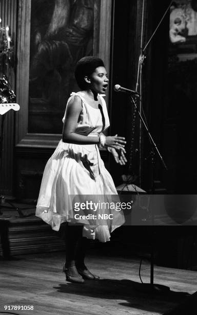 Episode 6 -- Pictured: Brazilian singer Margareth Menezes performs with David Byrne as the musical guest on November 18, 1989 --