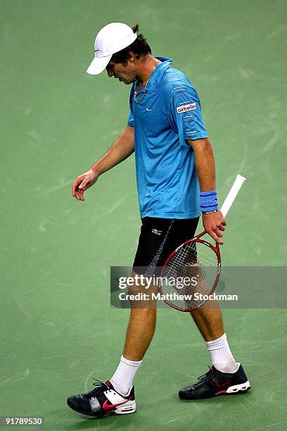 Mischa Zverev of Germany walks back to the baseline between points against Fernando Gonzalez of Chile during day two of the 2009 Shanghai ATP Masters...