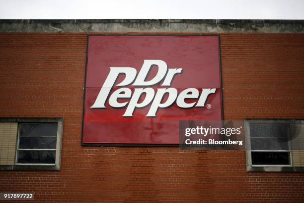 Dr. Pepper brand signage is displayed outside a bottling facility in Louisville, Kentucky, U.S., on Sunday, Feb. 11, 2018. Dr. Pepper Snapple Group...