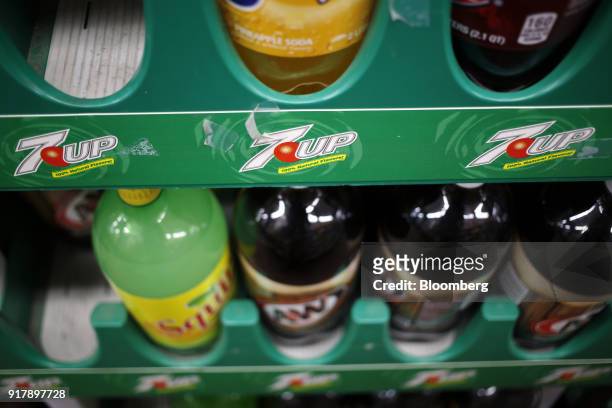 Dr. Pepper Snapple Group Inc. 7-UP brand signage is seen on a shelf at a convenience store in Bagdad, Kentucky, U.S., on Sunday, Feb. 11, 2018. Dr....