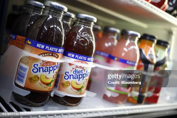 Bottles of Snapple brand Peach Tea beverages sit on display for sale at a convenience store in Bagdad, Kentucky, U.S., on Sunday, Feb. 11, 2018. Dr....