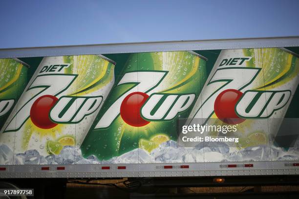Dr. Pepper Snapple Group Inc. 7-UP brand soda signage is seen on a delivery truck outside a facility in Louisville, Kentucky, U.S., on Tuesday, Feb....