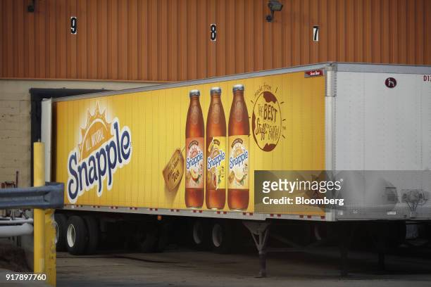 Snapple brand beverages signage is seen on a delivery truck outside a facility in Louisville, Kentucky, U.S., on Tuesday, Feb. 13, 2018. Dr. Pepper...
