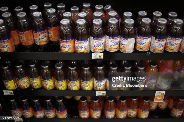 Bottles of Snapple brand beverages sit on display for sale at a grocery store in Louisville, Kentucky, U.S., on Tuesday, Feb. 13, 2018. Dr. Pepper...