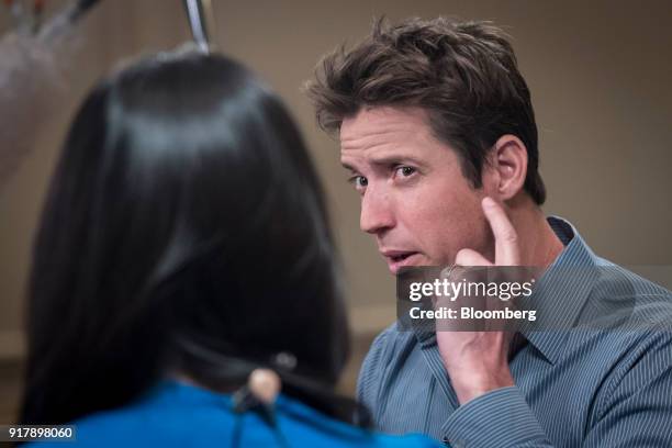 Nick Woodman, founder of extreme sports camera maker GoPro Inc., gestures while speaking during a Bloomberg Television interview at the Goldman Sachs...