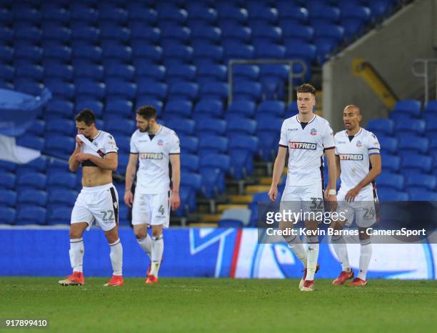 Bolton Wanderers' Filipe Morais, Dorian Dervite, Reece Burke and Karl Henry look dejected after Cardiff City's Sean Morrison scores his sides second...