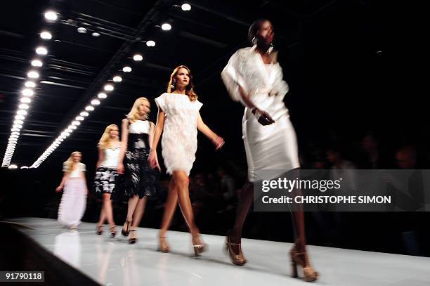 Models display creations of Mariella Burani Spring/Summer 2010 ready-to-wear collection on September 28, 2009 during the Women's fashion week in...