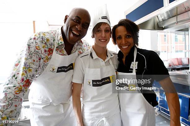 Young athlete Laura Weightman in the kitchen with Dame Kelly Holmes and Ainsley Harriott during the Aviva On Camp with Kelly Cookery Get-Together on...