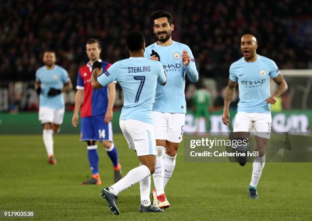 Ilkay Gundogan of Manchester City celebrates after scoring his sides fourth goal with Raheem Sterling of Manchester City during the UEFA Champions...