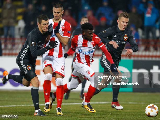 Aleksandar Pesic and El Fardou Ben Nabouhane of Crvena Zvezda in action against Pontus Wernbloom and Viktor Vasin of CSKA Moscow during UEFA Europa...