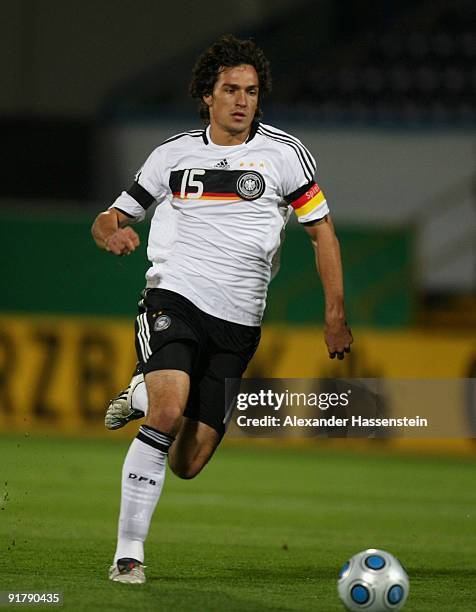 Mats Hummels of Germany runs with the ball during the international friendly match between Germany and Slovenia at the Playmobil Stadium on October...