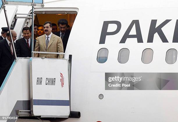 Pakistani Prime Minister Yousuf Raza Gilani arrrives at Beijing airport on October 12, 2009 in Beijing, China. Gilani will spend four days on his...