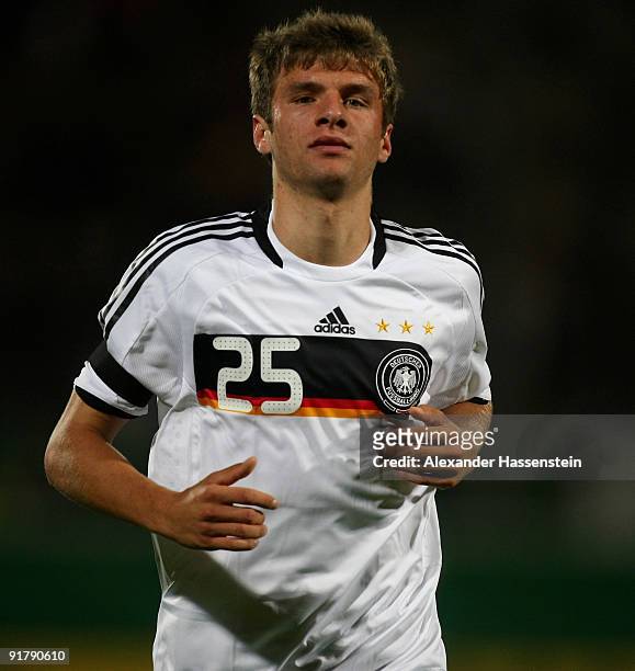 Thomas Mueller of Germany runs with the ball during the international friendly match between Germany and Slovenia at the Playmobil Stadium on October...