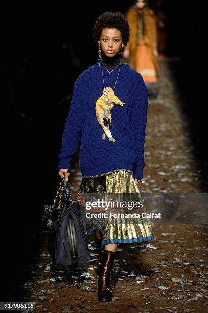 Model walks the runway for Coach 1941 during New York Fashion Week at Basketball City on February 13, 2018 in New York City.