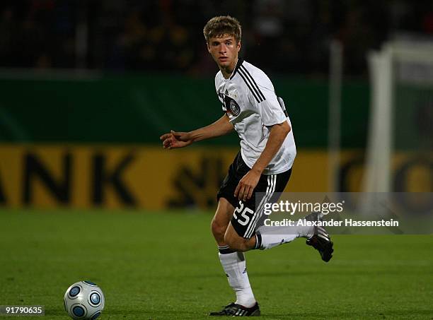 Thomas Mueller of Germany runs with the ball during the international friendly match between Germany and Slovenia at the Playmobil Stadium on October...