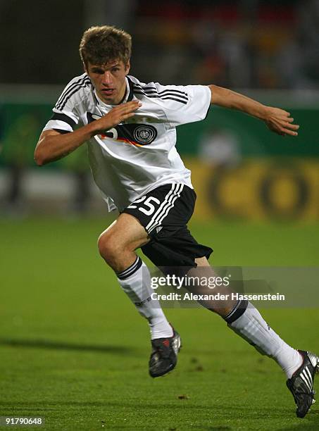 Thomas Mueller of Germany runs with the ball during the international friendly match between Germany and Slovenia at the Playmobil Stadium on October...