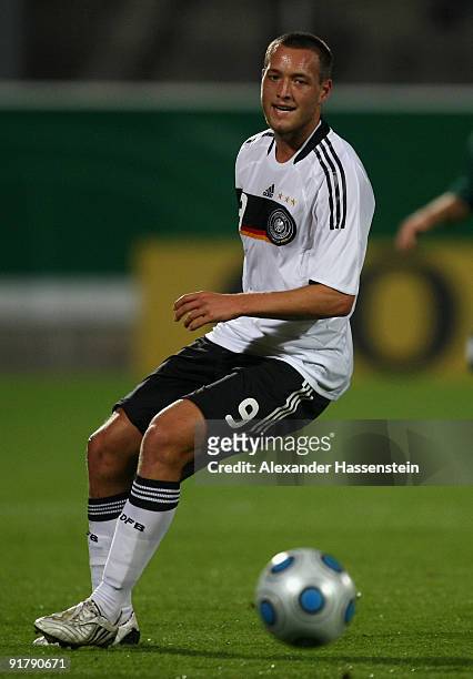 Julian Schieber of Germany runs with the ball during the international friendly match between Germany and Slovenia at the Playmobil Stadium on...