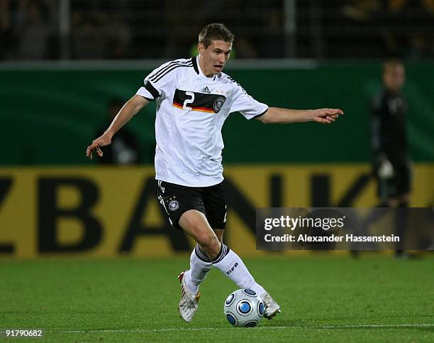 Daniel Schwaab of Germany runs with the ball during the international friendly match between Germany and Slovenia at the Playmobil Stadium on October...