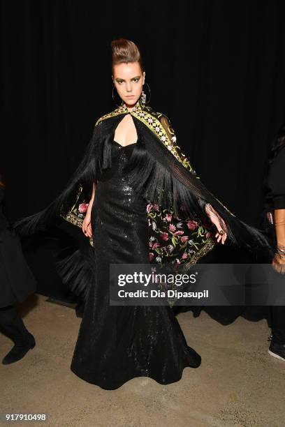 Model prepares backstage for Naeem Khan during New York Fashion Week: The Shows at Gallery I at Spring Studios on February 13, 2018 in New York City.