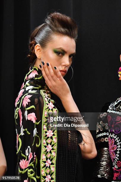 Models pose backstage for Naeem Khan during New York Fashion Week: The Shows at Gallery I at Spring Studios on February 13, 2018 in New York City.