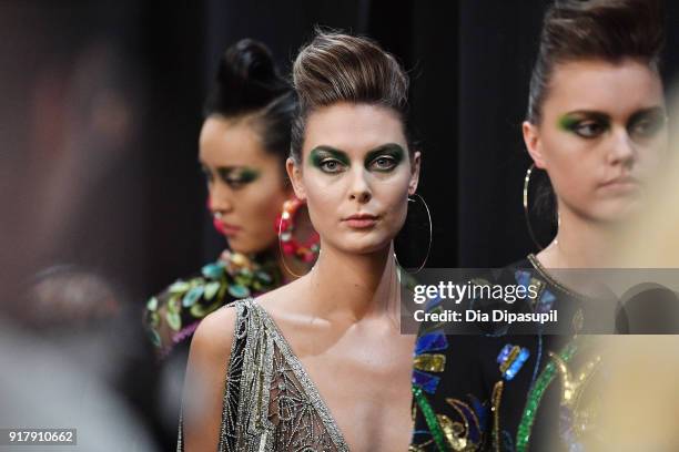 Model poses backstage for Naeem Khan during New York Fashion Week: The Shows at Gallery I at Spring Studios on February 13, 2018 in New York City.