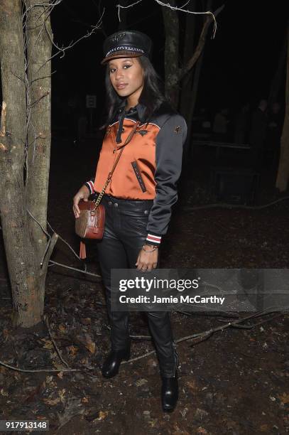 Recording Artist Dren attends the Coach 1941 front row during New York Fashion Week at Basketball City on February 13, 2018 in New York City.