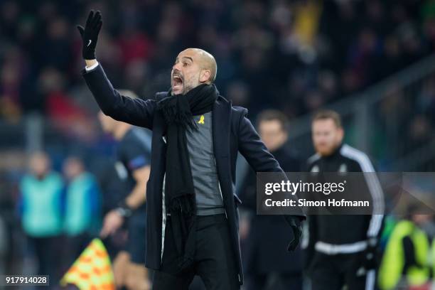 Manager Pep Guardiola of Manchester City reacts during the UEFA Champions League Round of 16 First Leg match between FC Basel and Manchester City at...