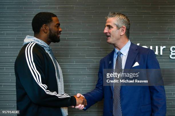 Head coach Frank Reich of the Indianapolis Colts talks with Jacoby Brissett following his introductory press conference at Lucas Oil Stadium on...