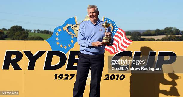 Colin Montgomerie, the European Ryder Cup captain gets his hands on the cup before the 'Year to Go' exhibition match at Celtic Manor Resort on...